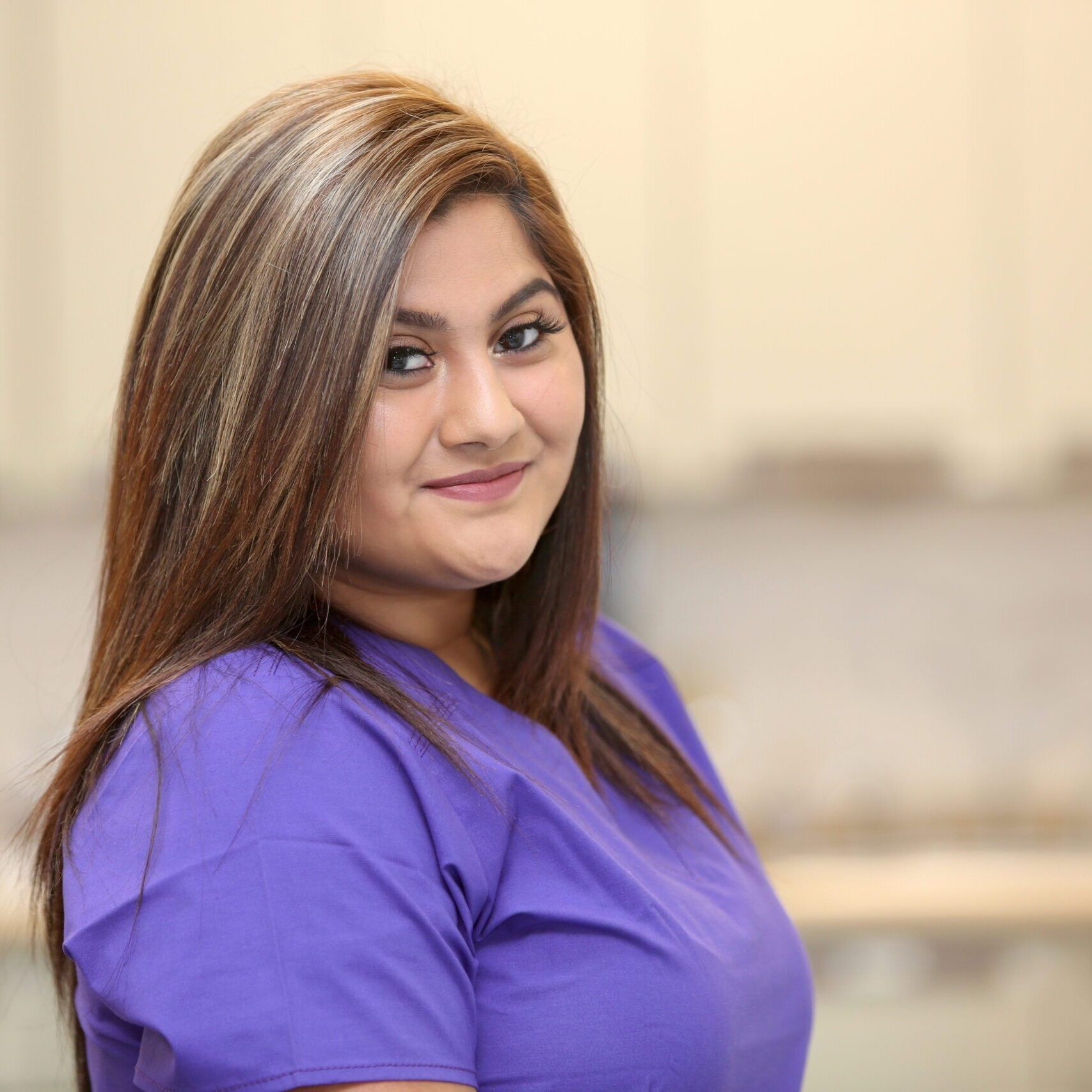 Portrait of an attractive hispanic woman healthcare professional, female nurse .